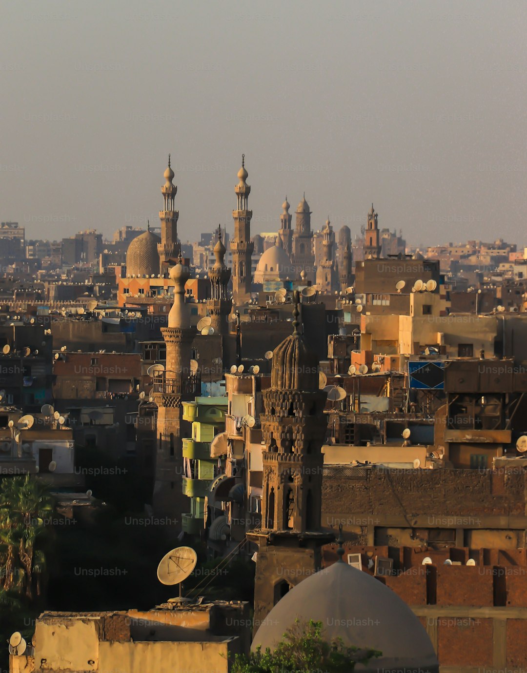 Islamic Cairo roofs and minarets at dusk